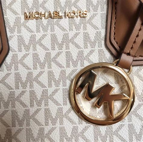 michael kors made in bangladesh original|Michael Kors metal logo.